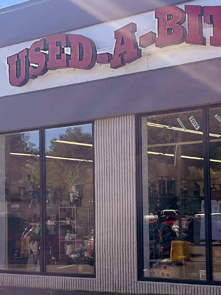 Front windows at Used-a-Bit Shoppe