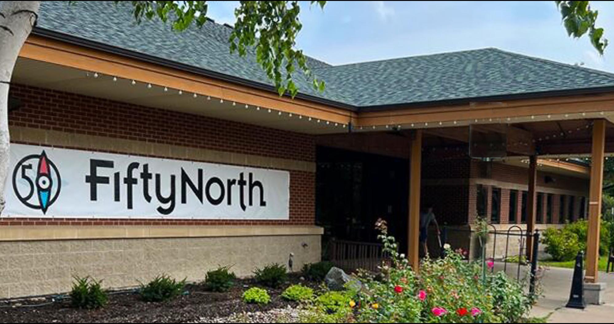 Photo of the front of the building with new logo and name
