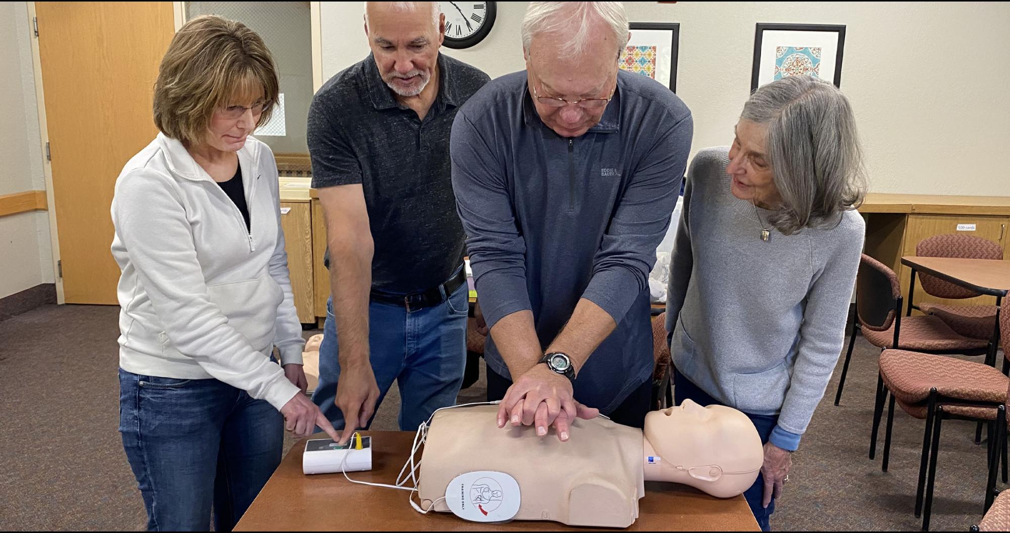 Men and women in a CPR class